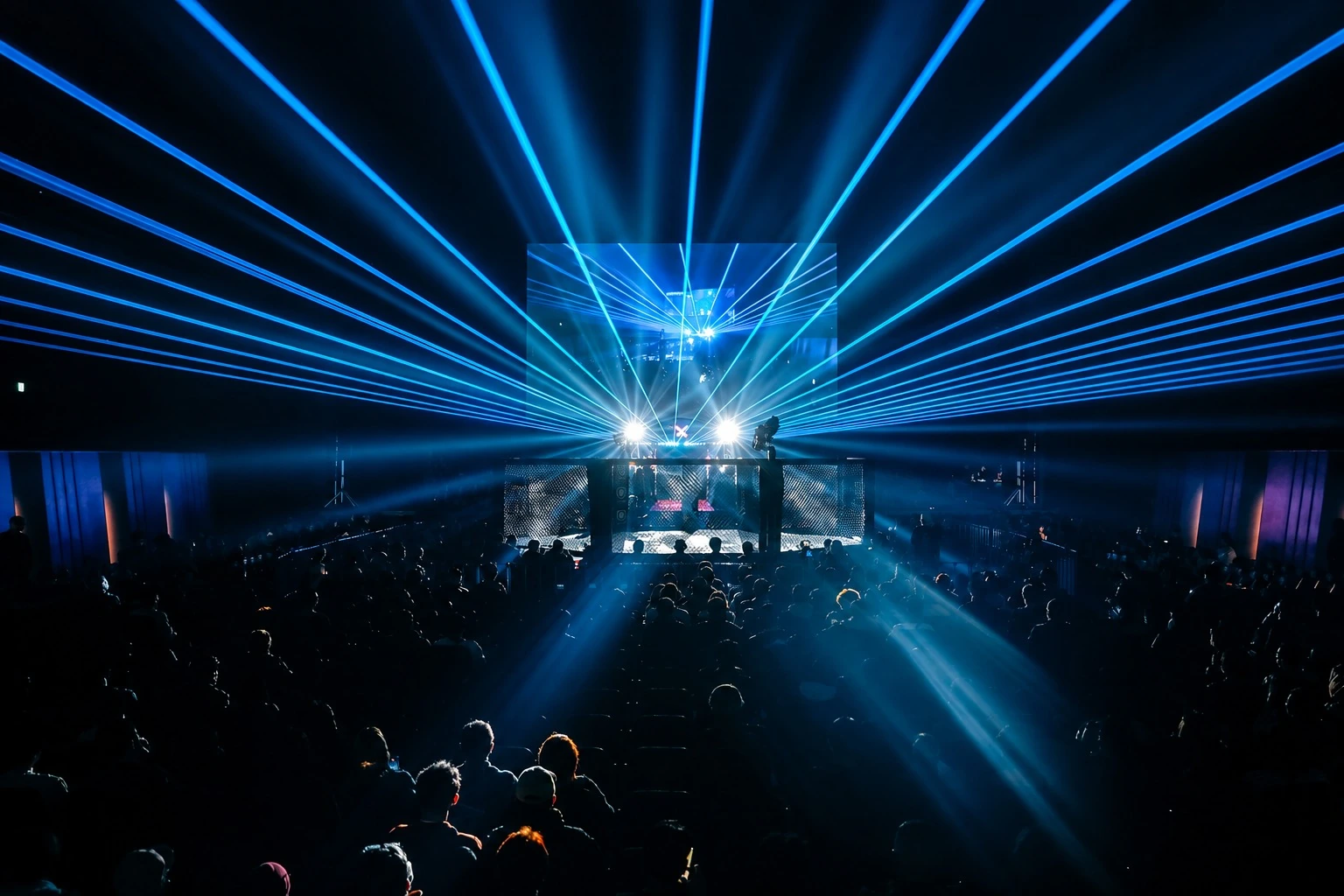 PANCRASE cage and crowd under blue and white laser lights
